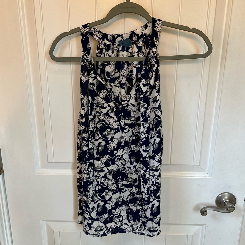 Sleeveless top blue and white floral design size XS